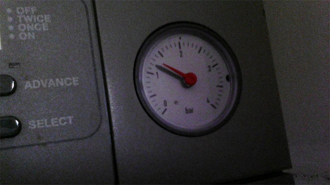 A water pressure gauge on a combi boiler.
